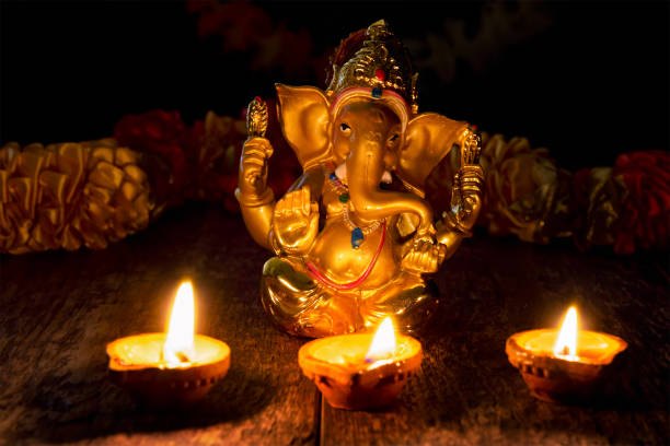 istock Ganesha with Diwali lights 1089061660