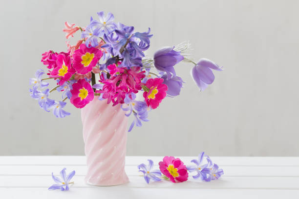 beautiful spring flowers in pink vase
