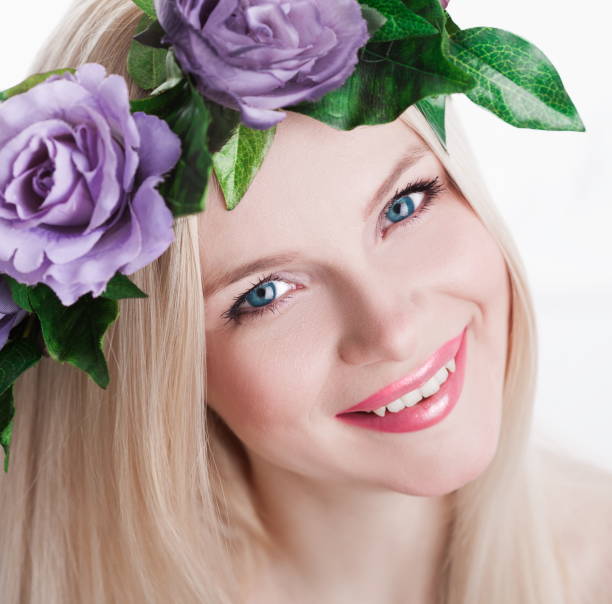 istock Studio, face, blue eyes, flower wreath, smile teeth,  white background 1089075670