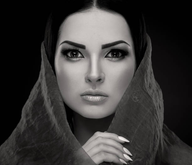 istock Studio, face, shawl, nails with manicure, black and white 1089083798