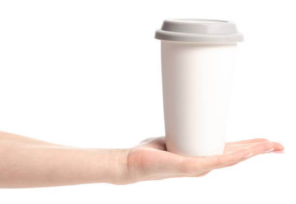 istock White cup mug with gray lid in hand 1089088534