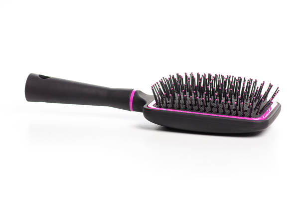 istock hairbrush comb female in hand 1089088940