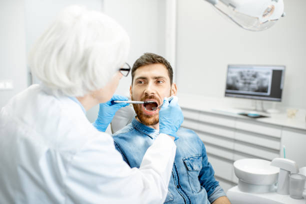 istock Man during the dental examintaion 1089094008