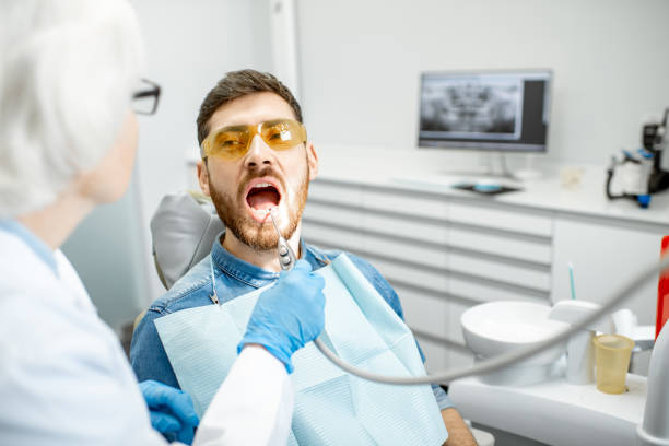 istock Man during the dental examintaion 1089094150