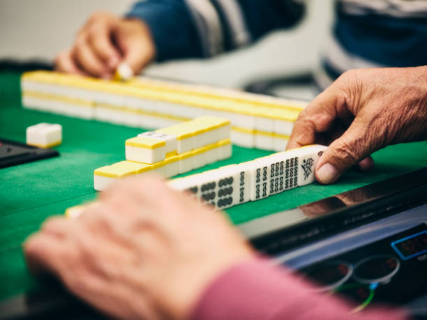istock Japanese Seniors Playing Mahjong 1089094382