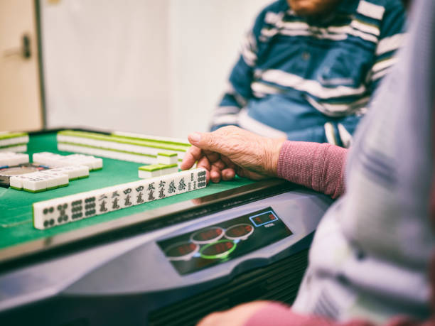 istock Japanese Seniors Playing Mahjong 1089096726