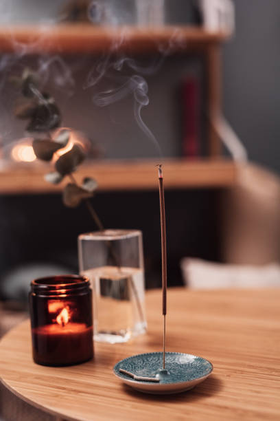 istock Burning Incense indoors in living room with candlelight 1089101034