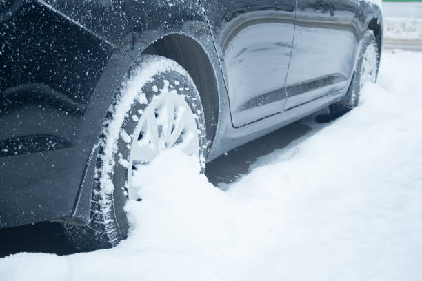istock Wheel of car at snow 1089104360