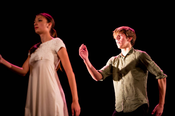 istock Young dancers performing on a theater stage 1089116350