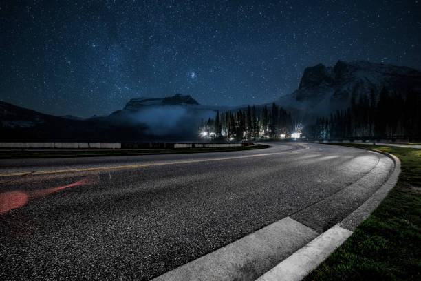 istock empty tarmac road under milky way by Emerald Lake in Yoho national park 1089119430