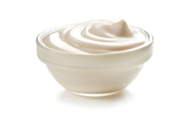 istock Bowl of sour cream, isolated on white background. 1089135932