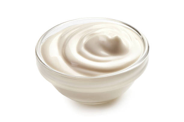 istock Bowl of sour cream, isolated on white background. 1089135934