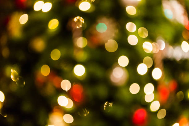 istock Christmas tree lights bokeh effect, blurred holiday background 1089137552