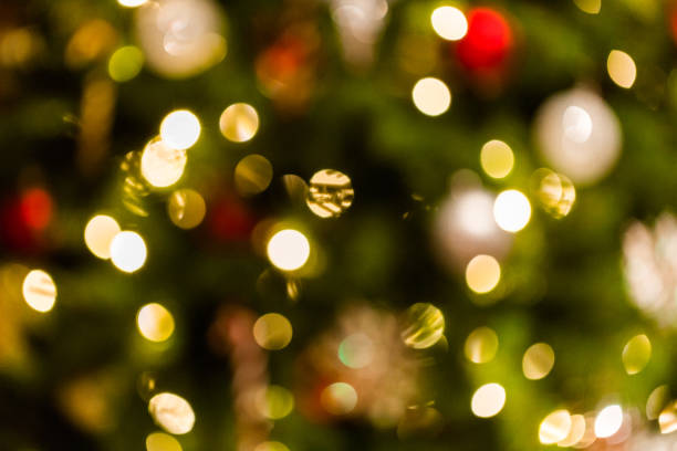 istock Christmas tree lights bokeh effect, blurred holiday background 1089137558