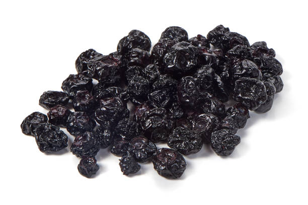 istock Dried bilberries, close-up, isolated on white background. 1089138008