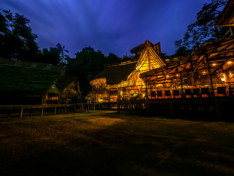 Cuyabeno, Ecuador - October 24, 2018: An eco lodge in Cuyabeno Wildlife Reserve in the middle of Amazon rainforest at night.