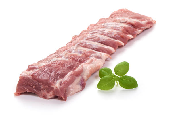 istock Fresh raw pork loin with ribs, close-up, isolated on white background. 1089141466