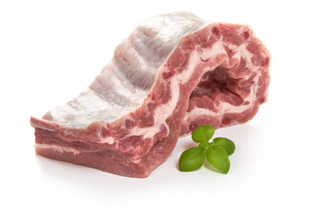 istock Fresh raw pork loin with ribs, close-up, isolated on white background. 1089141468