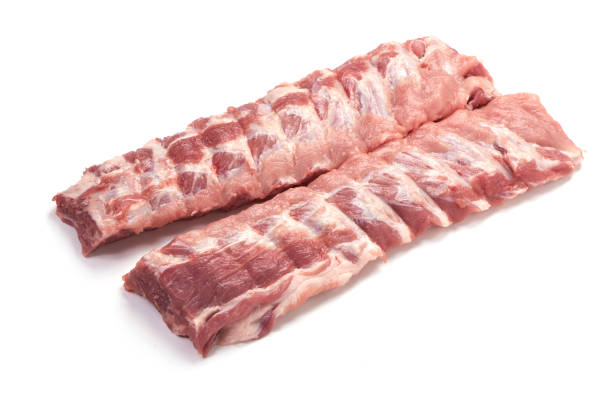 istock Fresh raw pork loin with ribs, close-up, isolated on white background. 1089141476