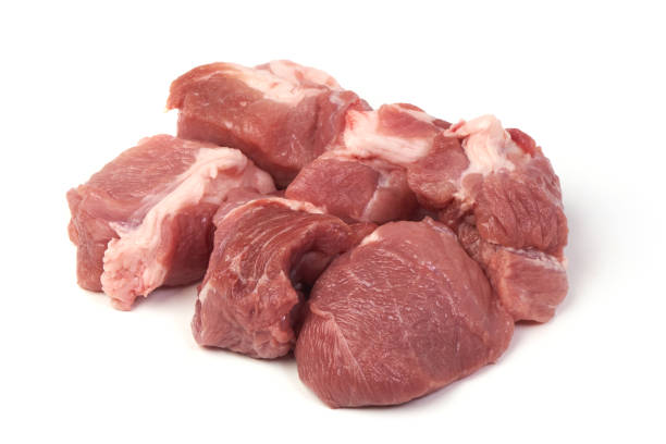 istock Raw pork pieces, close-up, isolated on white background. 1089141502