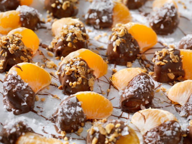 istock Chocolate Dipped Oranges with Roasted Nuts and Flake Salt 1089143468
