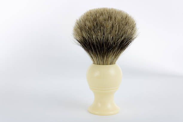 istock Classic hand-made pure badger shaving brush on white background 1089143646