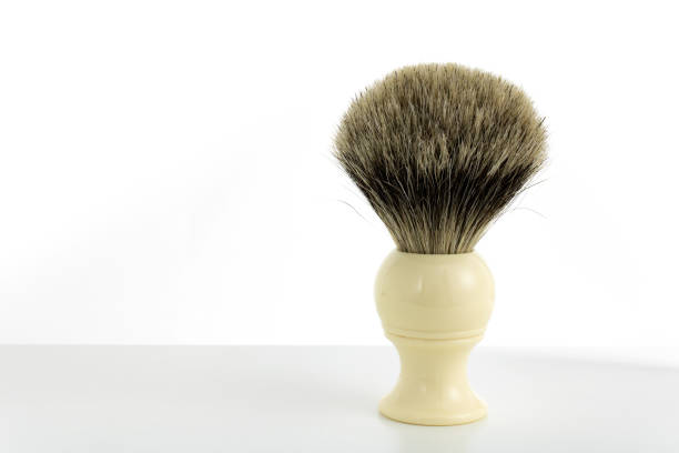 istock Classic hand-made pure badger shaving brush on white background 1089143658