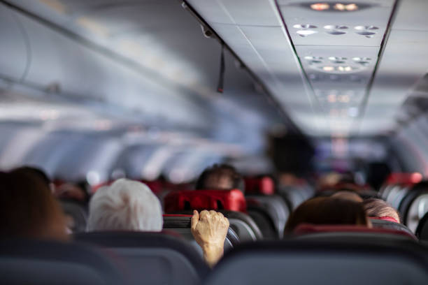 Fear of flying airplanes. Hand holding airplane seat. Fear of flying airplanes. Hand holding airplane seat. airplane crash photos stock pictures, royalty-free photos & images
