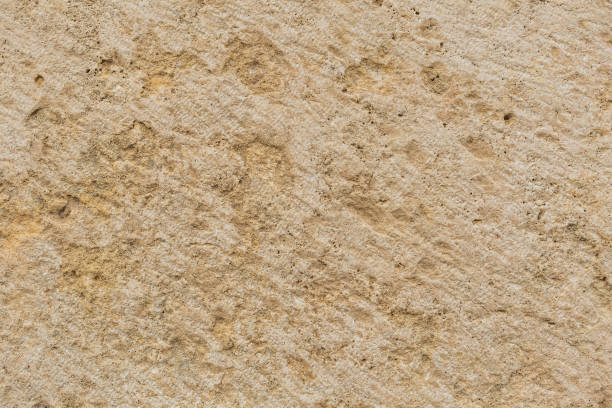 istock Yellow stone background. Natural background. Horizontal color photography 1089147776