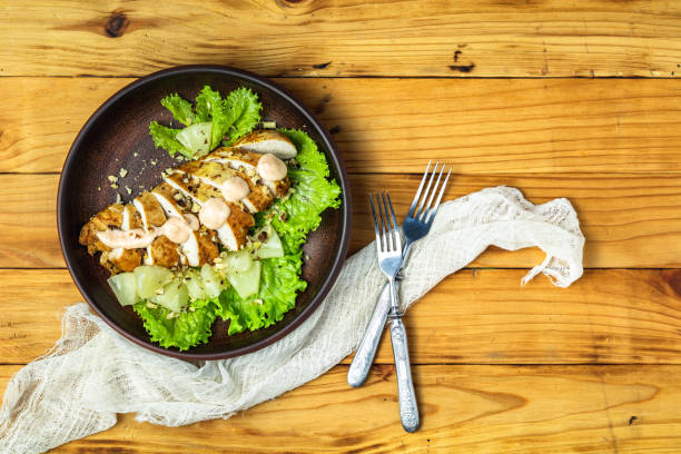 istock Chicken salad with pineapple, lettuce, cream sauce and walnut 1089147904