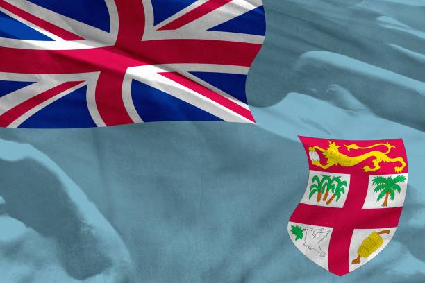 istock Waving Fiji flag for using as texture or background, the flag is fluttering on the wind 1089149880