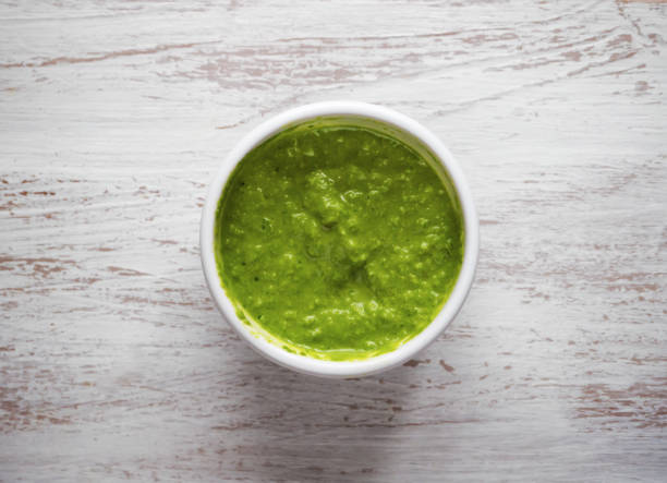 istock The green sauce in a bowl. Top view. 1089154446