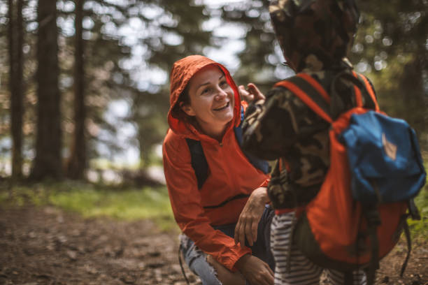 istock Mother and son hiking in forest 1089156452