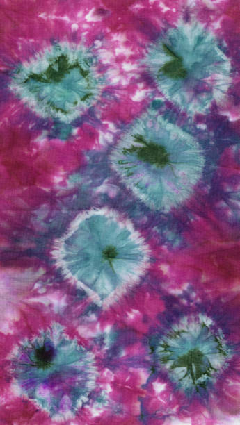 istock Abstract hand painted floral fabric tie-dye bright pink blue background 1089160198