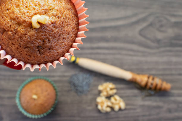 istock Medevnek, with ingredients arranged on wooden bottom (honey, poppy seed and nuts). With writing area. 1089160590