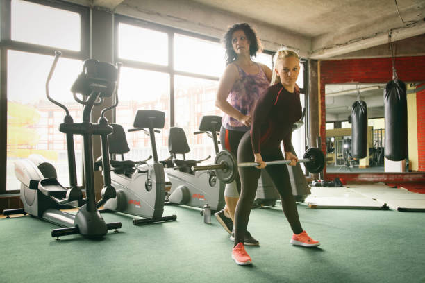 istock Women train at the gym 1089166642