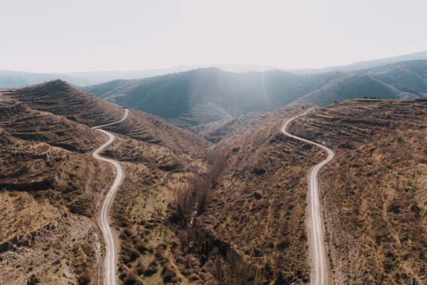 Two winding roads in mountains area