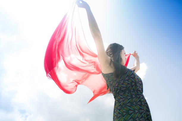 istock woman meditating in nature 1089171900