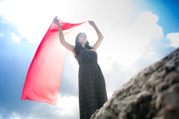 istock woman meditating in nature 1089171938