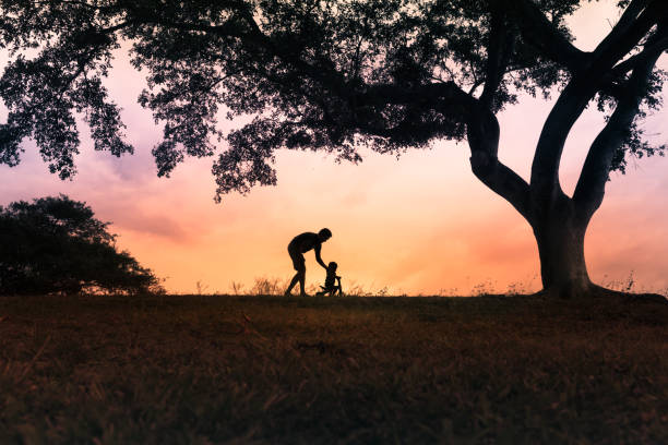 istock Father teaching his son to ride a bike 1089175084