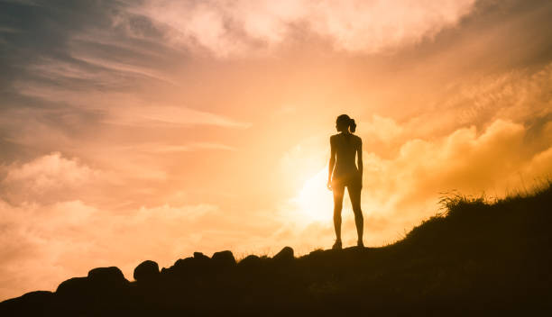 istock Woman at sunset 1089175190
