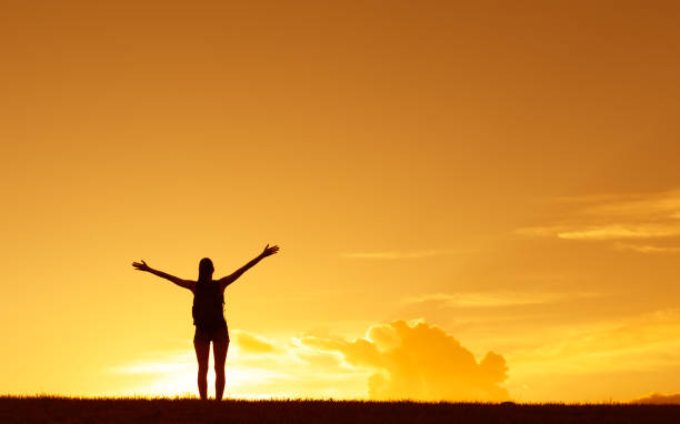 istock Woman hiker enjoying beautiful sunset 1089175246