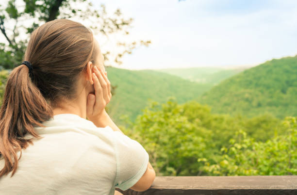 istock Woman enjoying beautiful nature view 1089175294