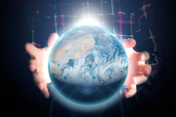 istock close up person's hands holding lighten planet earth, space concept. Elements of this image furnished by NASA 1089178566