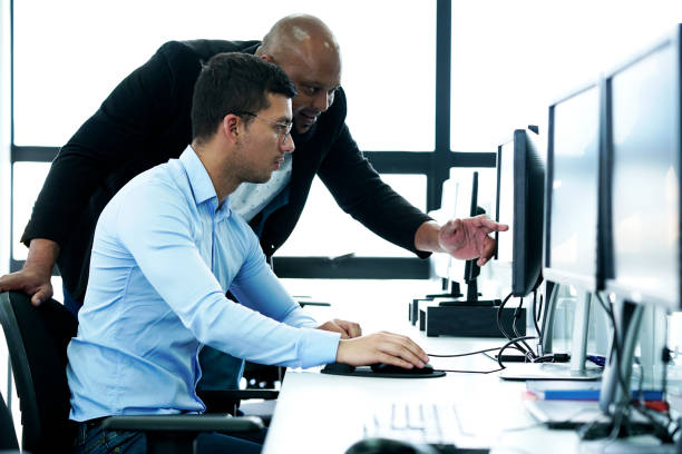 istock co-workers men reviewing a next job 1089181934