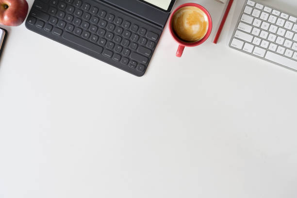 istock Top view office workspace with office supplies and copy space 1089192006