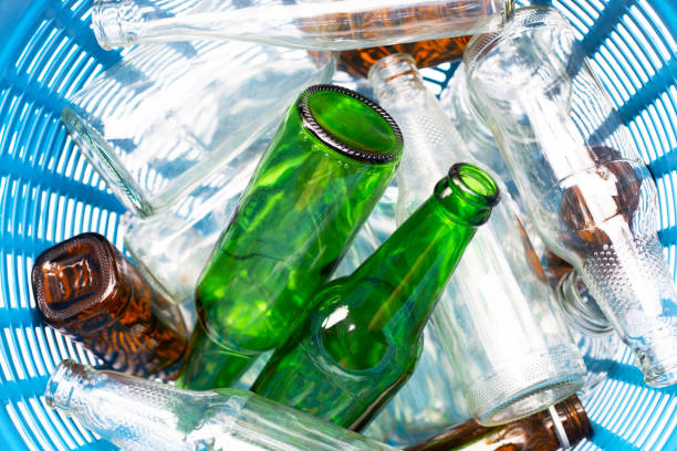 istock Glass bottles in waste basket. 1089193392