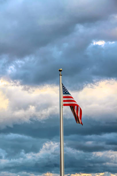 istock American Flag against a Stormy Background 1089193554