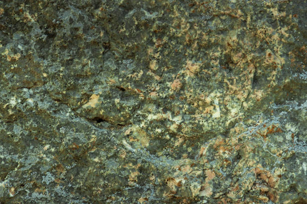 istock Close up of mountain rocks texture background 1089213970