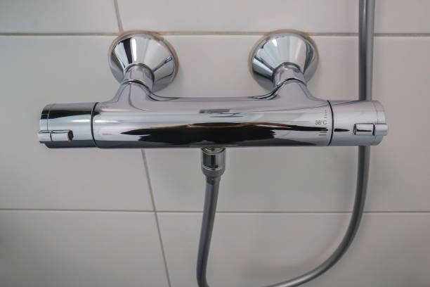istock hot and cold faucet with temperature control panel for shower in hotel bathroom 1089214184